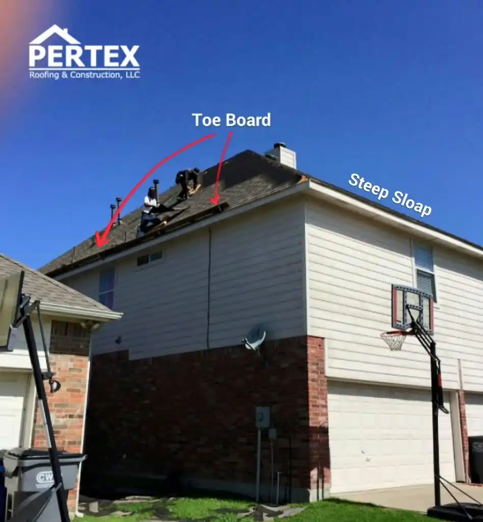 Steep slope roof with toe boards and safety setup