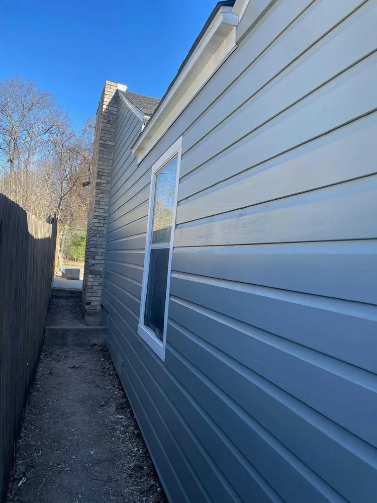 Completed new horizontal siding on Dallas Texas home exterior