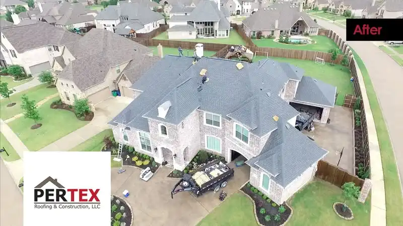 Completed shingle roof replacement aerial view